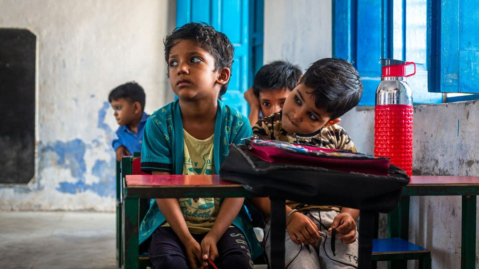 Students around a classroom table